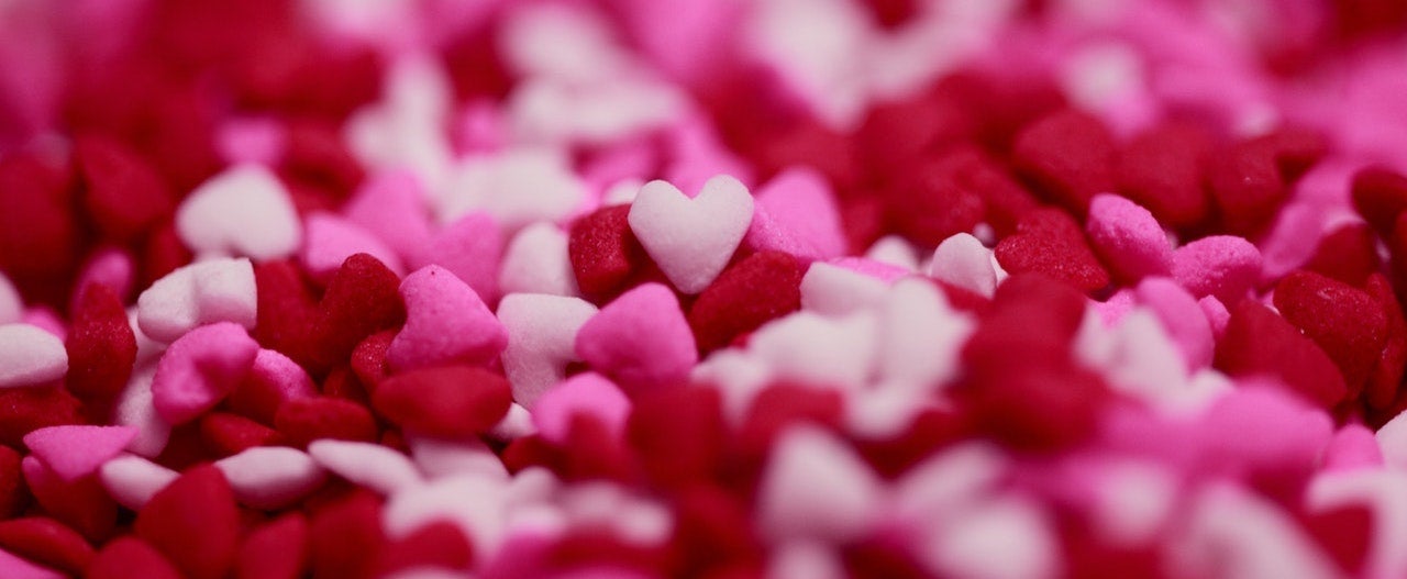 Close up image of pink, white, and red felt hearts