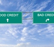 road sign pointing to good credit and bad credit scores
