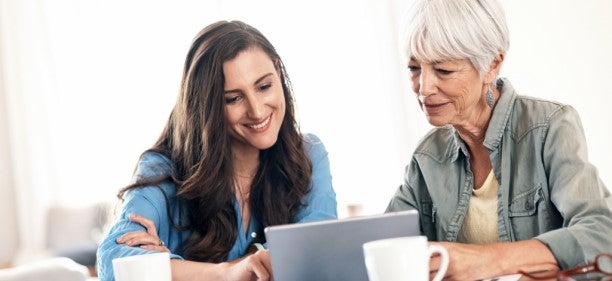 older mother and daughter discussing barclays online savings account